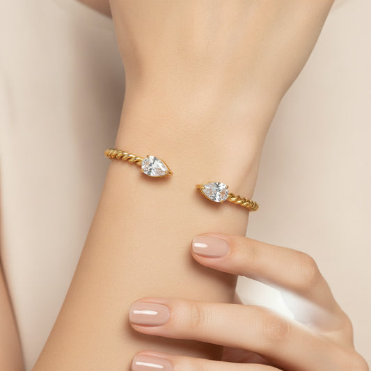 French Style Twisted Rope Open Cuff Bangle – 18K gold plated bangle with cubic zirconia, worn