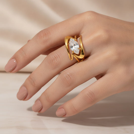 Elegant Curved Band Marquise Cubic Zirconia Ring – 18K gold PVD plated ring with marquise cubic zirconia, worn